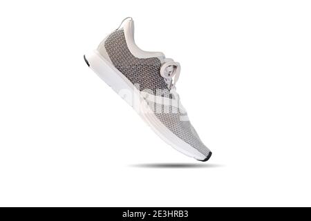 White and grey colors running shoe isolated on white background, with clipping path. Stock Photo