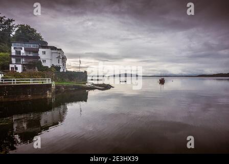 Crinan is a small village located on the west coast of Scotland in the region known as Argyll. This view shows the Crinan Hotel overlooking the harbou Stock Photo