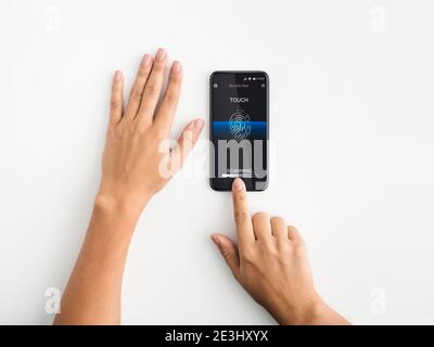 Woman Touching Fingerprint Scanner On Smartphone, White Background, Collage Stock Photo