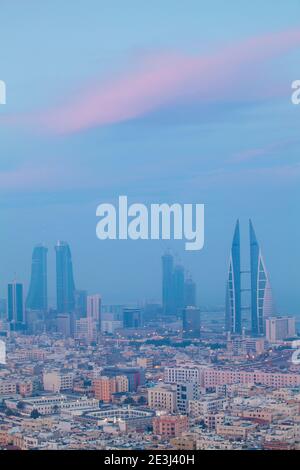 Bahrain, Manama, City center skyline looking towards Bahrain World Trade Center and Bahrain Financial Harbour Stock Photo