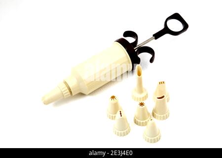 Icing Syringe and Nozzles Stock Photo