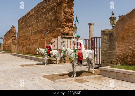 Guards at the entrance and walls to a ruined mosque at Hassan Tower and the Mausoleum of Mohammed V in Rabat, Morocco Stock Photo