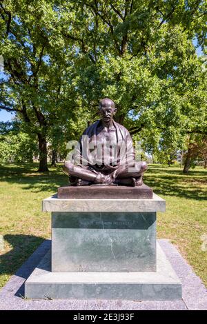 The sitting statue of Gandhi in the Ariana park in Geneva. Stock Photo