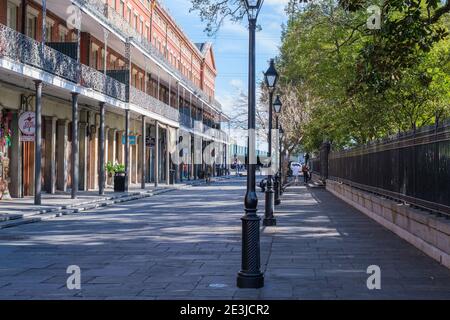 NEW ORLEANS, LA, USA - JANUARY 14, 2021: St. Ann Street between Lower Pontalba Building and Jackson Square in French Quarter Stock Photo