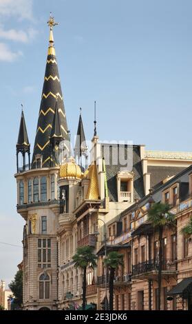 Old National Bank of Georgia and modern Astronomical clock at Memed Abashidze avenue in Batumi. Autonomous Republic of Adjara. Georgia Stock Photo