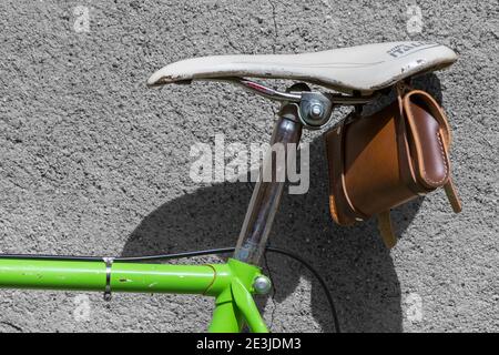Bike saddle and leather bag on bike bicycle close up detail - bicycle saddle Stock Photo