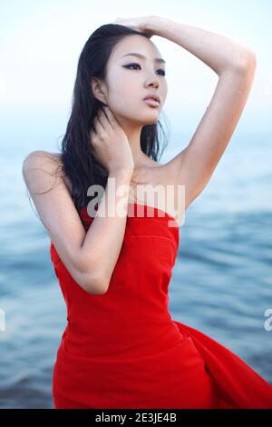 Portrait of Young woman by the sea high quality photo Stock Photo