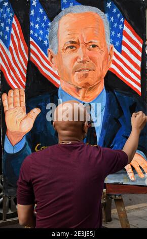 Mumbai, India. 19th Jan, 2021. An artist paints portraits of US President - elect Joe Biden.Joe Biden will be sworn in as US President and Kamala Harris will take oath as US Vice President on 20th January 2021. Credit: SOPA Images Limited/Alamy Live News Stock Photo