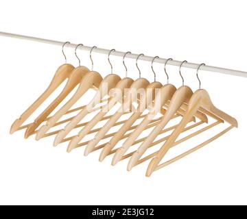 Close up of wooden cloth hangers in row isolated on white background Stock Photo