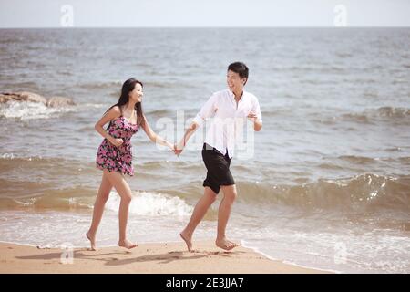 Portrait of a young Couple on seaside high quality photo Stock Photo