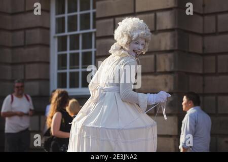 Edinburgh, Scotland - August 16 2016: A costumed pantomime street performer along the historic Royal Mile in Edinburgh, Scotland at the annual Fringe Stock Photo