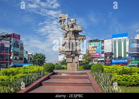 Monument to the Workers Struggle on roundabout in the town centre of Ho Chi Minh City, the former Saigon, Southeast Vietnam Stock Photo