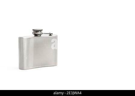 Metal hip flask on a white background with copy space Stock Photo