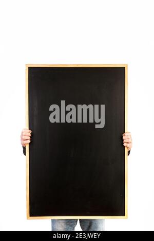 Man holding a blackboard on a white background Stock Photo