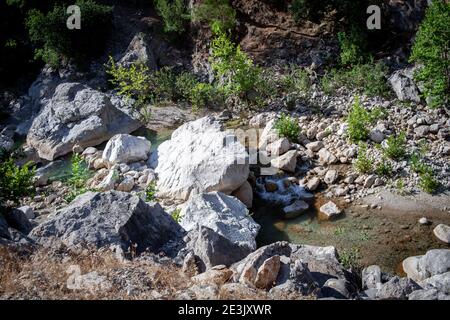View of a mountain creek river in the rocks in Goynuk canyon in Antalya province, Turkey. View from above Stock Photo