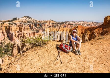 A woman hiking the Fairyland Loop TRail in Bryce Canyon National Park, Utah, USA. Stock Photo