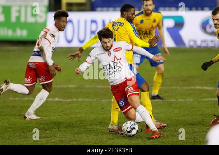 Mouscron's Bruno Xadas Alexandre Vieira Almeida and Waasland-Beveren's Georges Mandjeck fight for the ball during a soccer match between Royal Excel M Stock Photo