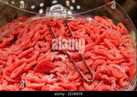 Close-up candies with jelly and sugar in confectionery. Colorful array of different childs sweets and treats. Bright party background. Selective focus Stock Photo