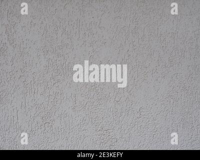 Wall with gray embossed decorative cladding. The texture is not seamless. Stock Photo