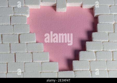 Heart copy space made with sugar cubes. Creative love or valentine concept Stock Photo