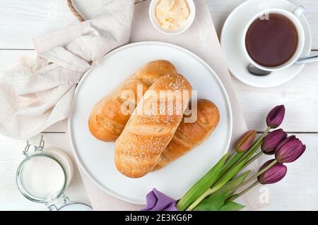 Fresh buns on a festive background. The view from the top. Stock Photo