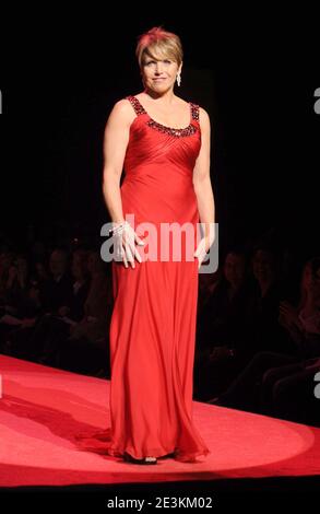 Manhattan, United States Of America. 14th Feb, 2007. NEW YORK - FEBRUARY 13: TV personality Katie Couric walks the runway wearing Donna Karan at the Heart Truth Red Dress Collection Fall 2009 fashion show during Mercedes-Benz Fashion Week at The Tent in Bryant Park on February 13, 2009 in New York City. People: Katie Couric Credit: Storms Media Group/Alamy Live News Stock Photo
