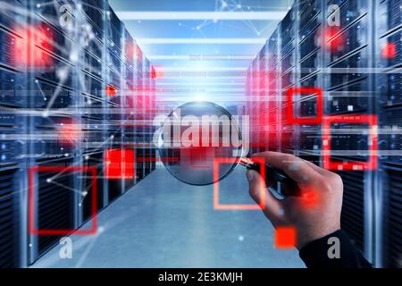 Hacker with magnifier lens try to read illegally protected information stored on server Stock Photo