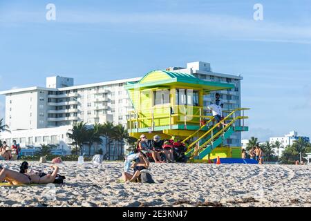 Miami, Florida - January 2, 2021: People Sunbathing in Miami Beach. Stock Photo