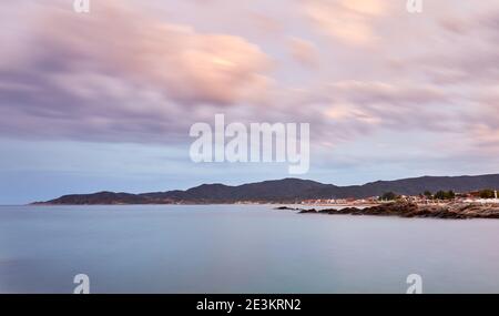 Sunset over Sarti beach, Sithonia, Chalkidiki, Greece; view over Sarti bay; long exposure shot Stock Photo