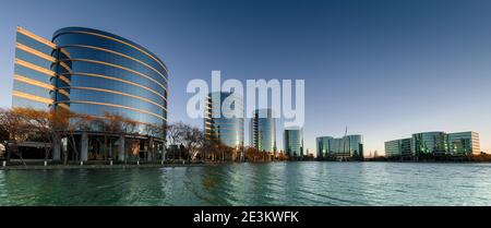 Redwood Shores, California - January 19, 2021: Sunrise over Oracle Headquarters and Lake. Stock Photo