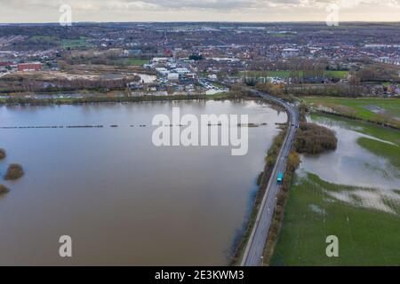 Aerial drone photo of the town of Allerton Bywater near Castleford in Leeds West Yorkshire showing the flooded fields from the River Aire on a rainy w Stock Photo