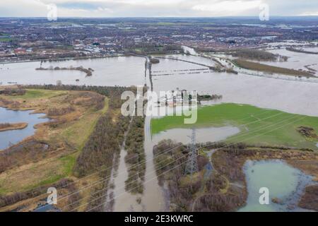 Aerial drone photo of the town of Allerton Bywater near Castleford in Leeds West Yorkshire showing the flooded fields and farm house from the River Ai Stock Photo