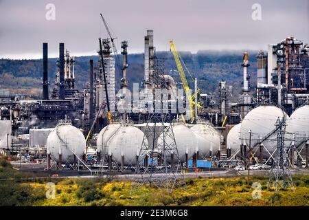 Round steel tanks to store gas at the Irving Oil Refinery in Saint John New Brunswick Canada. Stock Photo