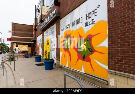 Boarded up storefronts in Minneapolis, Minnesota with MLK quotes and murals during the social unrest following the killing of George Floyd Stock Photo