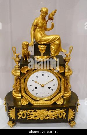 Mantel Clock with the Figure of Clotho, Louis-Jacques Vaillant, c. 1810, patinated bronze, gilded mounts, enameled metal dial Stock Photo