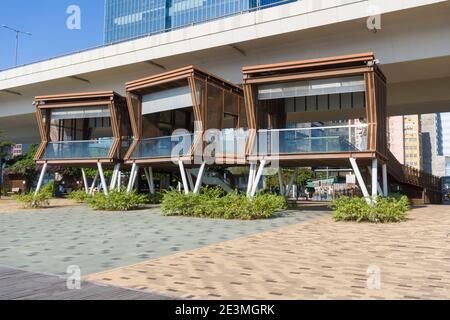 Kwun Tong Promenade in Hong Kong, Models of Mechanical Cranes and Waste Paper bundles are the Artistic Attractions of the Promenade Stock Photo