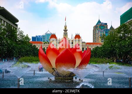 A fountain at the downtown at Nguyen Hue street in Ho Chi Minh long shot Stock Photo