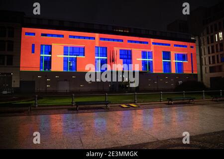 Berlin, Germany. 19th Jan, 2021. The façade of the French Embassy on Pariser Platz is illuminated. This is a test run for a multimedia show that is intended to celebrate the friendship between the two countries on Franco-German Day on 22 January. Credit: Paul Zinken/dpa-Zentralbild/dpa/Alamy Live News Stock Photo
