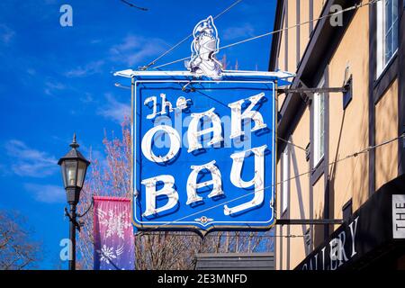 A view of the Oak Bay Theatre neon sign, in the historic Castle Block on Oak Bay Avenue in Oak Bay Village, Victoria, Canada. Stock Photo