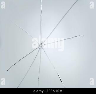Broken window glass crack splitter on white gray background Stock Photo