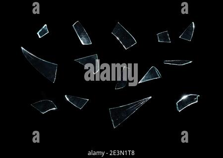 Broken Glass With Sharp Pieces Over Black Stock Photo, Picture and