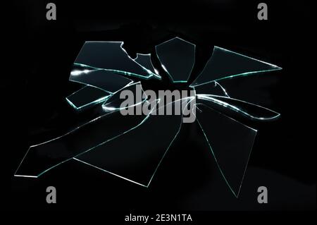 Broken Glass With Sharp Pieces Over Black Stock Photo, Picture and