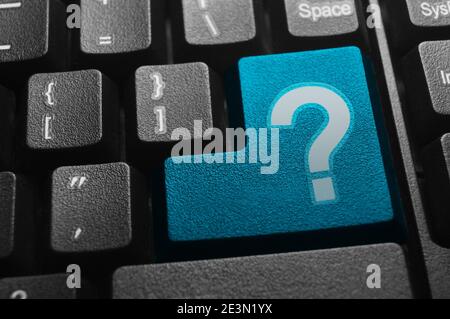 Close up view on conceptual keyboard - Question mark key Stock Photo
