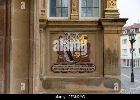 Buildings around town square in Hildesheim are beautifully decorated by ancient craftsmen. Details are all over half-timbered buildings. Stock Photo