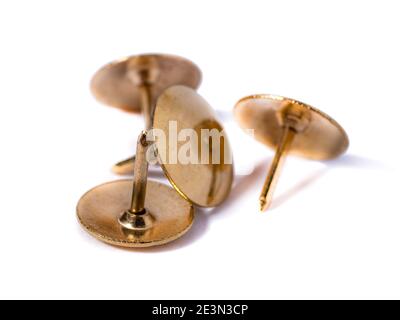 Closeup metal tacks isolated on a white. Office concept Stock Photo
