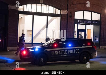 Seattle, USA. 19th Jan, 2021. Late in the night Seattle swat responding to a barricaded suspect at The Morison apartments in Pioneer Square on 3rd ave across from the Court House. Downtown has seen a sharp increase in crime since the Covid-19 shutdown the city. Credit: James Anderson/Alamy Live News Stock Photo