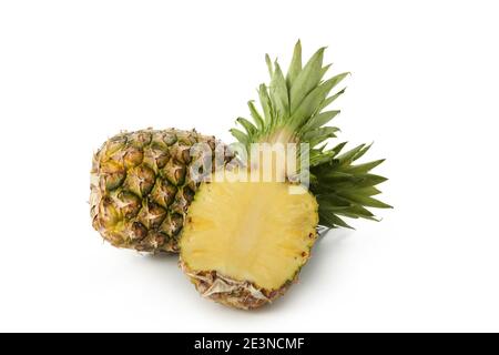 Tasty ripe pineapples isolated on white background Stock Photo