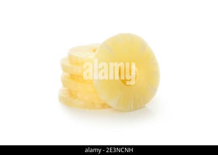 Fanned golden pineapple slices on white, a ripe pineapple slices cutout for tropical summer designs Stock Photo