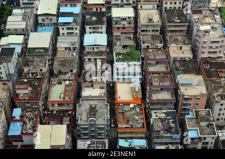 Rooftops of the 'handshake' community in Shenzhen. So called because you are so close to your neighbour you could shake hands from your window. Stock Photo