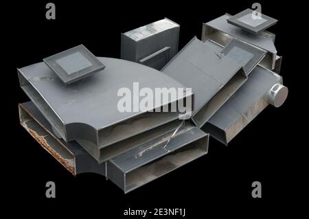 Used metal parts of the central ventilation  systems isolated on black Stock Photo